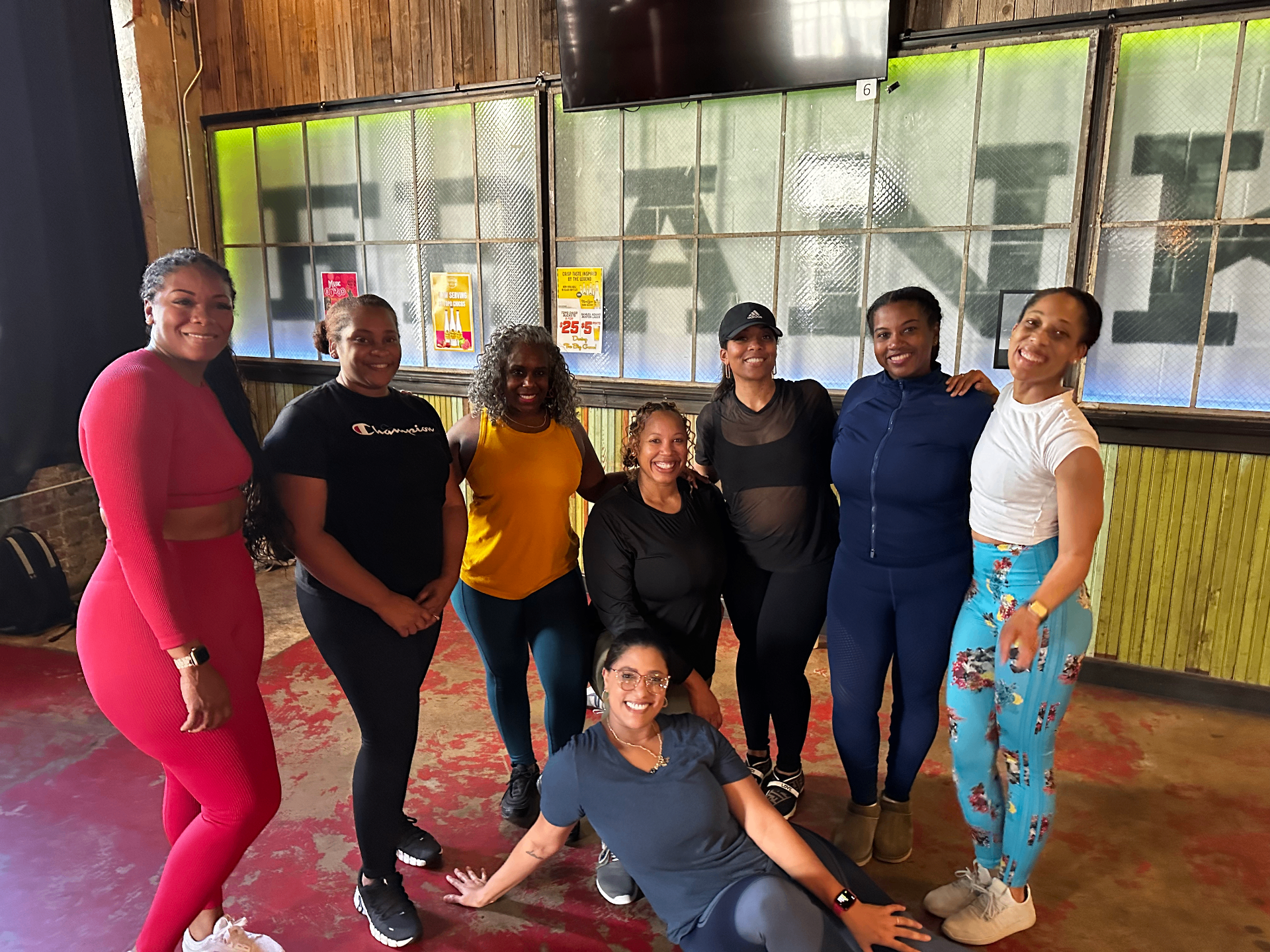 Members of the Fine As A Motha Collective training together and smiling